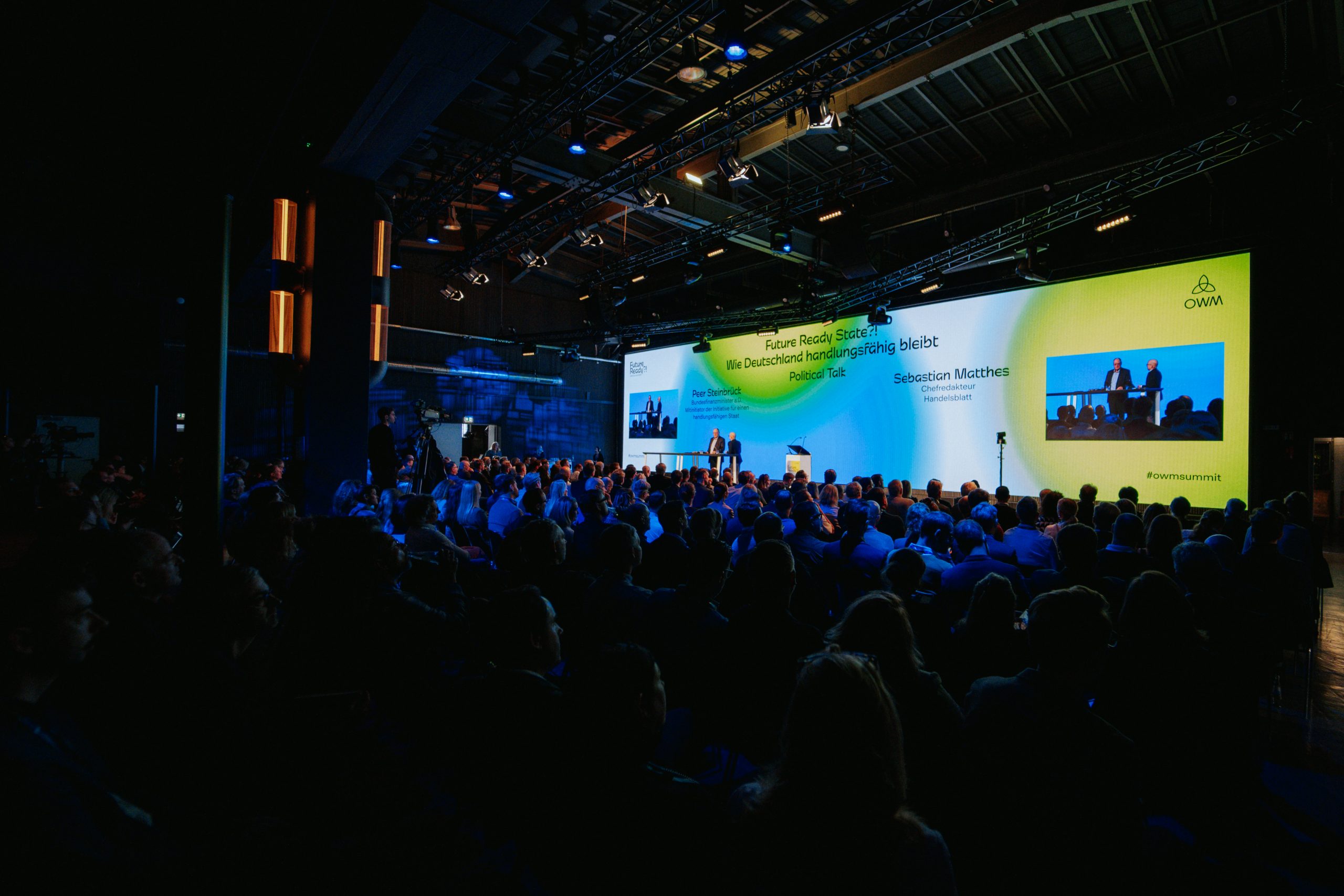 OWM_Summit_2025_alte Münze_30 Jahre_agentur_VATERBLUT_LED Wand_Panel