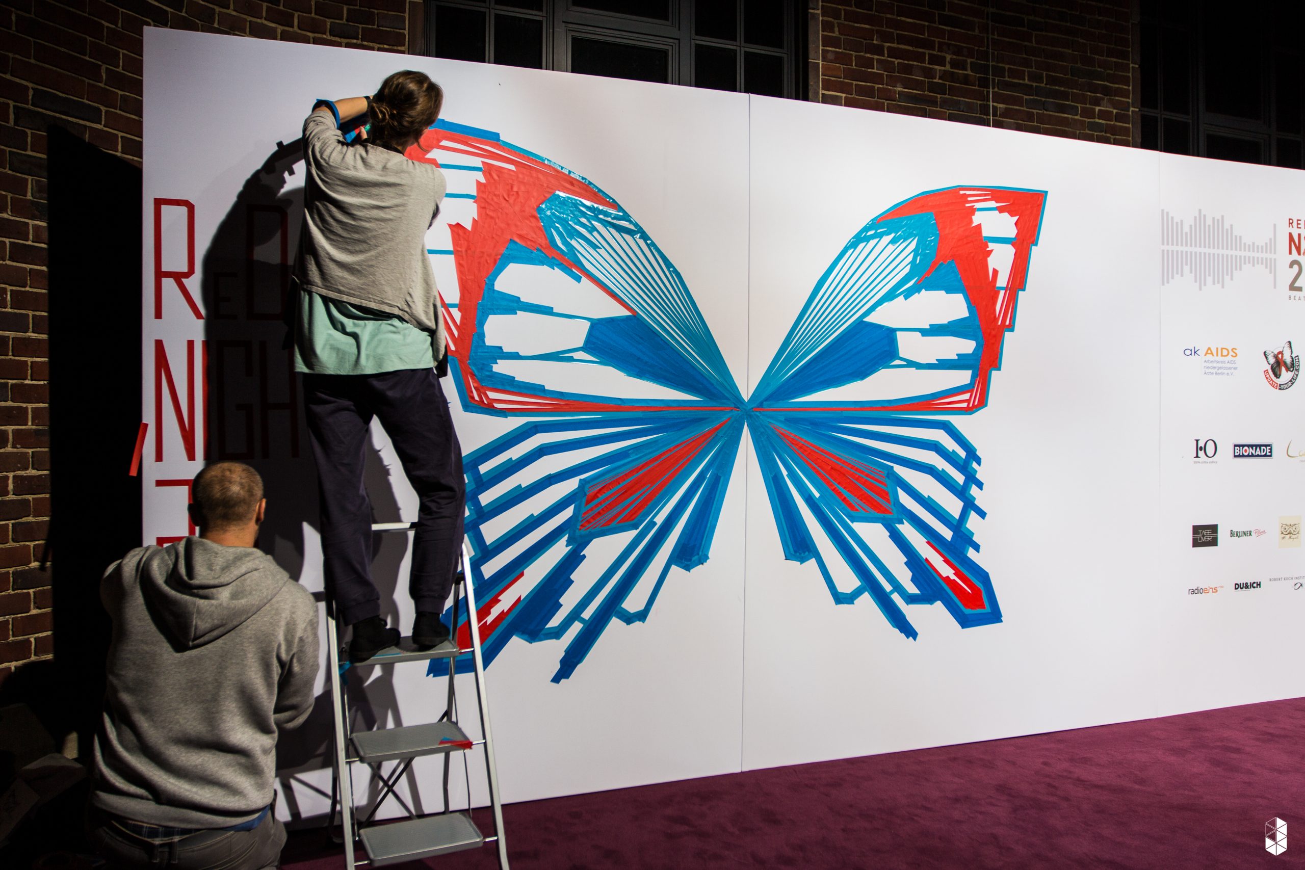 hiv_aids_event_kongress_vaterblut_Fotowand_Schmetterling_Fotospot_Aufbau